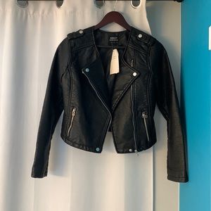 Black vegan leather jacket with silver embellishments. Size medium